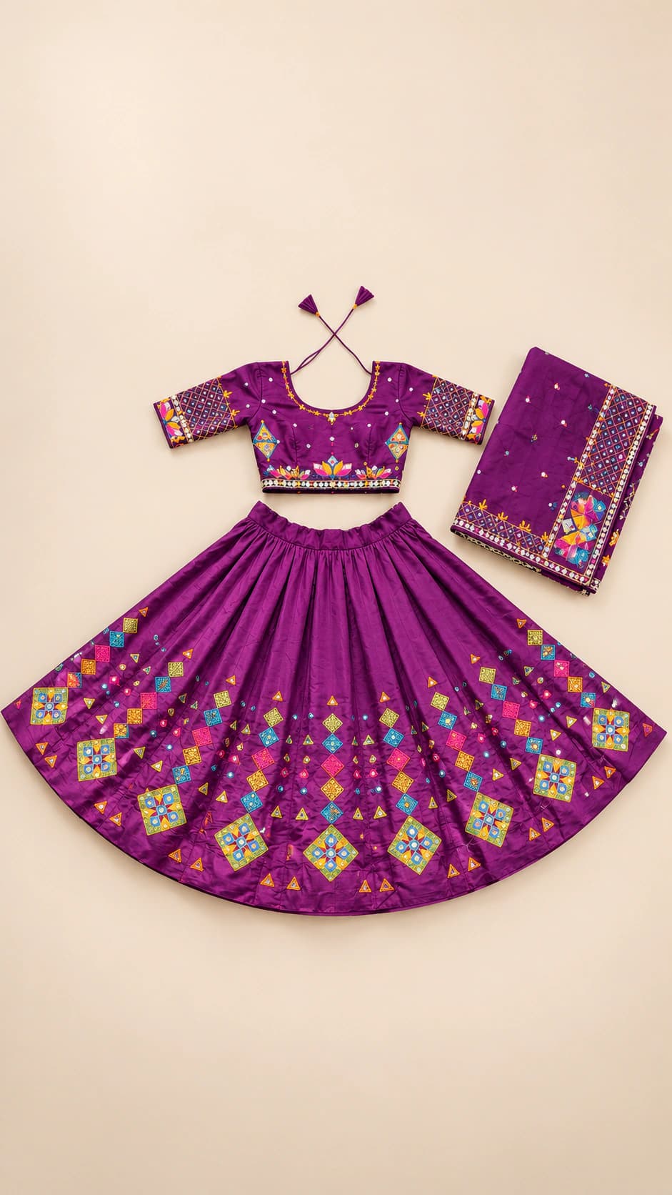 Amethyst Folk: A deep purple Garba set brightened with multicolour folk motifs, diamond-patterned skirt panels and a richly edged dupatta.