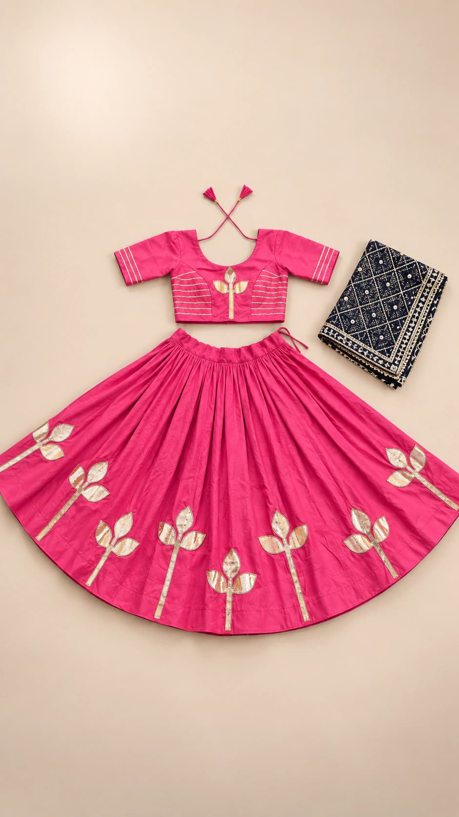 Fuchsia Lotus: A vivid fuchsia ensemble with scattered ivory lotus-like motifs, a sleek contrast trim and a patterned dark dupatta.