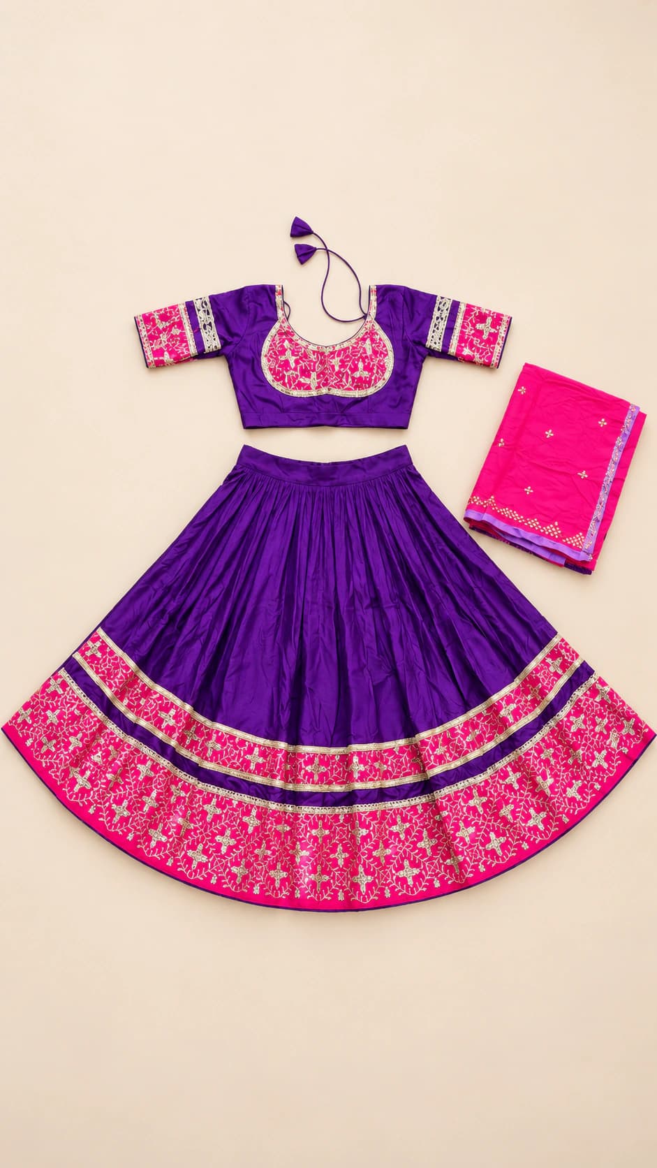 Violet Gulabi: A rich violet lehenga paired with a bright gulabi-pink border, decorated blouse and matching pink dupatta for a vivid two-tone look.